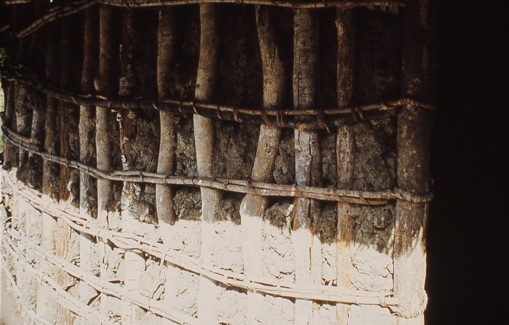 Wood and mud constructed building exterior DW Digital Archive